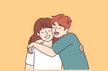 Positive little boy and girl hugging and laughing enjoying spending time together or summer vacation. Concept of happy childhood and friendship between classmates or little brother and sister . Positive little boy and girl hugging and laughing enjoying spending time together