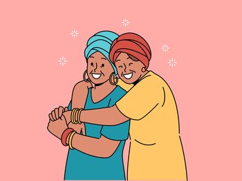 Happy adult mother and daughter in national african clothes embrace together, rejoicing at meeting. Mature woman hugging elderly mother, feeling gratitude and recognition for good upbringing. Happy adult mother and daughter in national african clothes embrace together, rejoicing at meeting