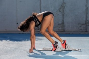 woman practices exit on running track