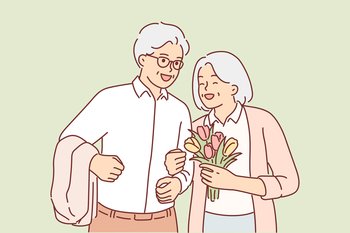 Grandparents in love during date or marriage ceremony, for concept of love in old age. Grandmother with flowers presented by grandfather in honor of anniversary of wedding or beginning life together. Grandparents in love during date or marriage ceremony, for concept of love in old age