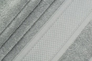 bath towel with folds. textured fabric background. backgrounds of fabrics and textiles