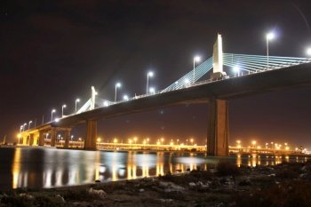 The Rades-La Goulette Bridge illuminates the bay of Tunis with its nighttime splendor. Tunis Tunisie