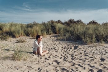 beach woman netherlands dunes