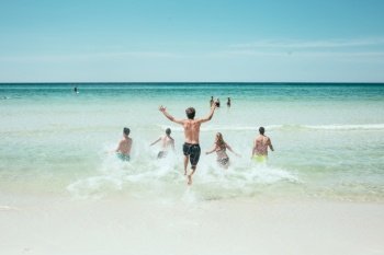 beach people running ocean sea