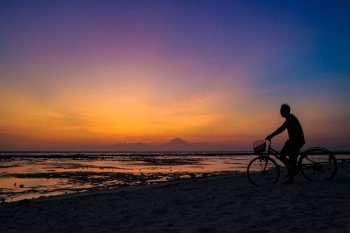 beach sunset cycling man sea