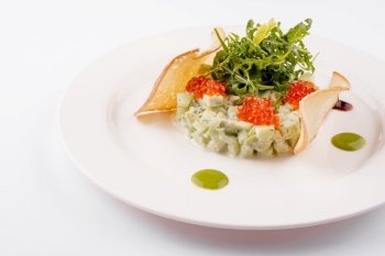 cucumber and red caviar tartare with arugula