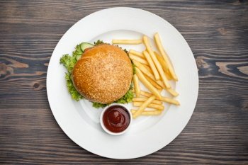 delicious dish of burger and french fries in a restaurant