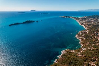Aerial drone view to seascape with clear blue water. Amazing azure Mediterranean coast background. Travel destination, universal nature, resort, summer vacation. . High quality photo. Aerial drone view to seascape with clear blue water. Amazing azure Mediterranean coast background. Travel destination, universal nature, resort, summer vacation. 