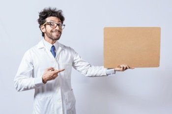 Scientist showing and pointing at a blank clipboard, Professor in white coat holding and showing a blank clipboard isolated. A scientist in a white coat is holding and showing a blank clipboard