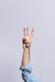 Hand counting number three, Man hand showing number three, Guy finger counting number three on isolated background