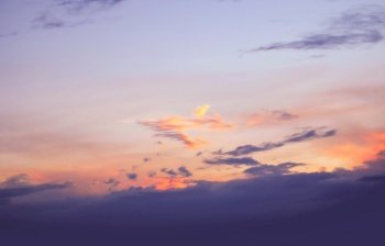 Real amazing panoramic sunrise or sunset sky with gentle colorful clouds. Long panorama, crop it
