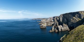 panorama view of the cliffs and rugged coastline of the Mizen Peninsula in County Cork of southwestern Ireland