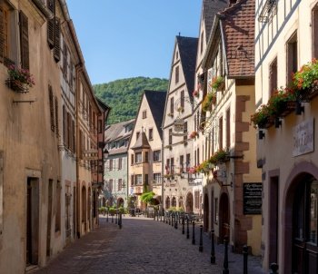 Kaysersberg, France - 30 May, 2022: historic village center of Kaysersberg with a view of the Charles de Gaulle street