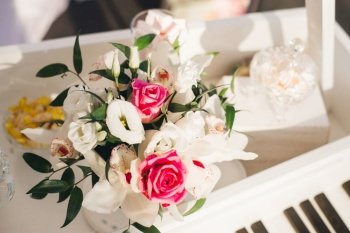 Bright wedding bouquet of the bride with white eustoma and pink roses