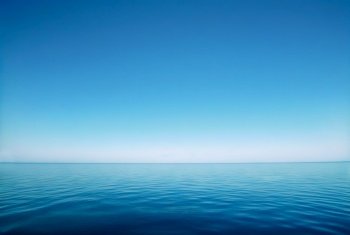 Minimalistic sea horizon under a blue sky. Generative AI.. Minimalistic sea horizon under a blue sky. Generative AI