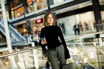 Portrait of modern woman in shopping mall