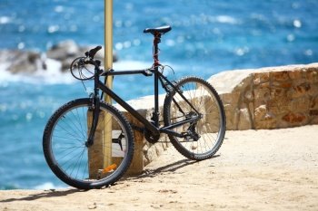 bicycle on the background of the blue sea on a hot sunny day, travel tourism concept.  bicycle on the background of the blue sea 