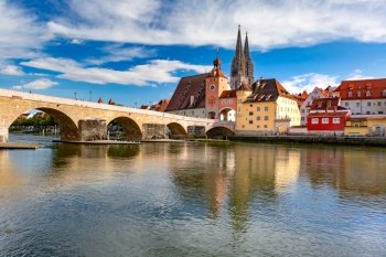 Sunny Stone Bridge, Cathedral and Old Town of Regensburg, eastern Bavaria, Germany. Sunny old Town of Regensburg, Bavaria, Germany