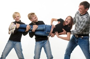 Dad and sons pull sister in different directions, white background