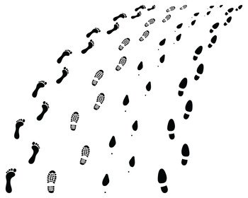 Trail of human barefoots and shoe prints