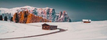 amazing winter landscape at sunrise in Alpe di Siusi. Dolomites  Italy - winter holidays destination