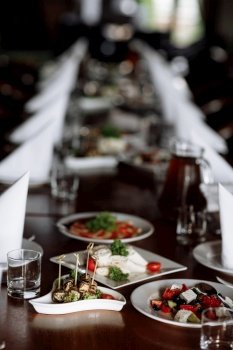 Beautiful table set for an event party or wedding reception . restaurant interior.. Beautiful table set for an event party or wedding reception . restaurant interior