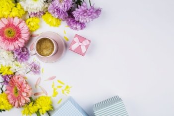 fresh flowers near cup drink present boxes petals