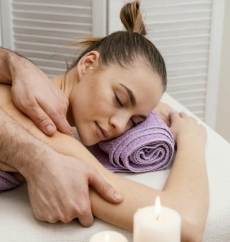close up woman receiving massage