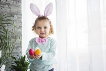 pretty girl with easter eggs
