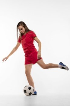 female football player kicking ball 5