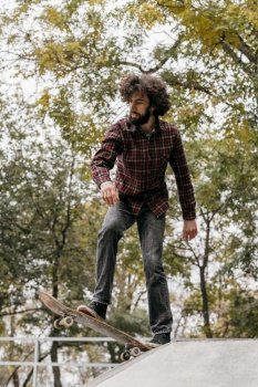 man enjoying skateboarding park