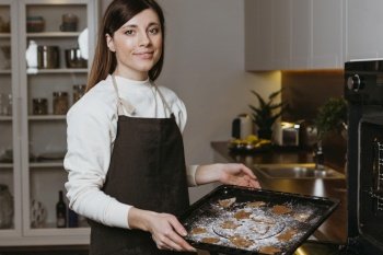 woman baking cookies home