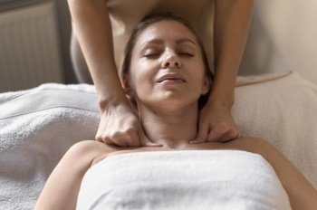 close up woman experiencing massage