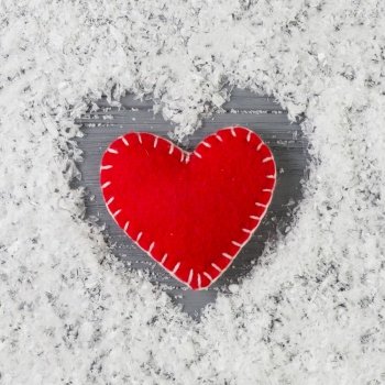 red heart decorative snow wooden desk