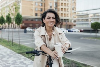 pretty adult woman posing with eco friendly bike 2