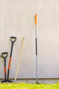 Shovel spade work tools standing outside. Gardening and agricultural equipment essentials concept.. Shovel spade standing outside.