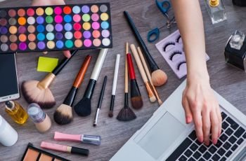 The fashion blogger with make-up accessories. Fashion blogger with make-up accessories