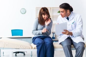 The mentally ill woman patient during doctor visit. Mentally ill woman patient during doctor visit