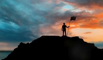 business, success, leadership, achievement and people concept - silhouette of businessman with flag on mountain top over sunset background. silhouette of businessman with flag on mountain