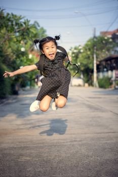 cheerful children jump and floating mid air playing with happiness emotion