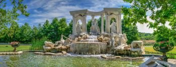 Ravadinovo, Bulgaria – 07.11.2019.  Large antique fountain in the form of a sculptural composition in the castle of Ravadinovo, Bulgaria, on a sunny summer day. Large antique fountain in the castle of Ravadinovo, Bulgaria