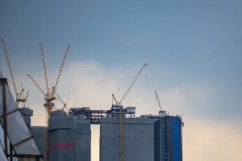 construction site building with crane, skyscraper building construction