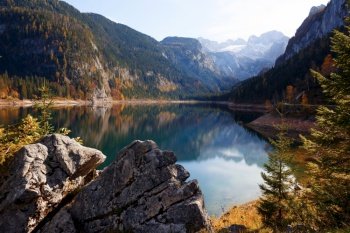 landscape with a beautiful mountain lake with reflection. Autumn. Hinterer Gosausee

