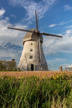Cit Araisi, Latvia. Old historic  windmill and nature.1405.2020