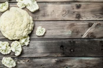 Juicy fresh cabbage. On a wooden background.. Juicy fresh cabbage.