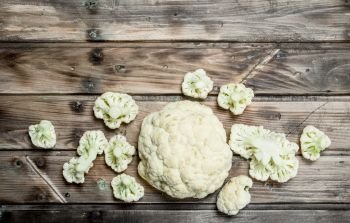 Juicy fresh cabbage. On a wooden background.. Juicy fresh cabbage.
