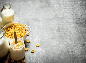 Fitness food. Corn cereal with milk. On the stone table. Fitness food. Corn cereal with milk.