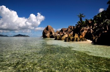 Idyllic beach with granitic rocks in Anse Gaulettes, La Digue island, Seychelles