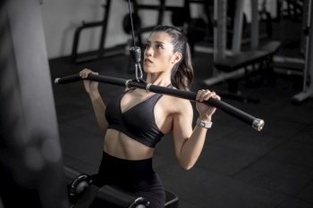Beautiful perfect body woman is work out in the gym 