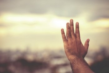 Man hands praying for blessing from god 